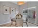Bright dining area featuring modern decor, with a sliding glass door leading to an outdoor space at 4305 W 118Th Pl, Westminster, CO 80031
