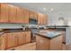 Well-equipped kitchen featuring ample cabinetry, granite countertops, and modern appliances at 4305 W 118Th Pl, Westminster, CO 80031