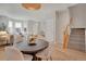Open floor plan with living and dining area, stairway and entry door in view at 4305 W 118Th Pl, Westminster, CO 80031