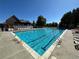 Outdoor pool with crystal blue water and lounge chairs at 4305 W 118Th Pl, Westminster, CO 80031
