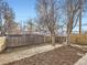 Small backyard with wood fence and mulch ground at 3259 N Adams St, Denver, CO 80205