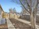 Small backyard with wood fence and gravel ground at 3259 N Adams St, Denver, CO 80205