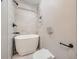 Updated bathroom with a toilet and a soaking tub at 3259 N Adams St, Denver, CO 80205