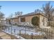 Inviting home with well-kept landscaping and distinctive stone detailing enhancing its curb appeal at 3259 N Adams St, Denver, CO 80205