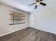 Bright living room with wood floors and natural light streaming through the window at 3259 N Adams St, Denver, CO 80205