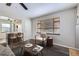 Cozy living room featuring wood floors, a window, and comfortable seating arrangement at 3259 N Adams St, Denver, CO 80205