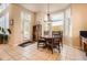 Cozy breakfast nook with a bay window and exterior access, perfect for casual dining at 10456 Carriage Club Dr, Lone Tree, CO 80124