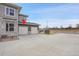 Lovely townhome with gray siding and stone accents, and a two-car garage at 330 High Point Dr # B102, Longmont, CO 80504