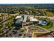 Community recreation center with pool, parking lot, and nearby homes at 10551 Applebrook Cir, Highlands Ranch, CO 80130