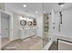 Spa-like bathroom with double vanity and walk-in shower at 10551 Applebrook Cir, Highlands Ranch, CO 80130