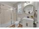 Elegant bathroom with a walk-in shower, vanity, and modern fixtures at 10551 Applebrook Cir, Highlands Ranch, CO 80130