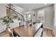 Bright dining room with a rectangular table and hardwood floors at 10551 Applebrook Cir, Highlands Ranch, CO 80130