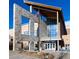 Community recreation center with stone facade and large glass windows at 10551 Applebrook Cir, Highlands Ranch, CO 80130