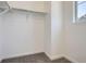 Walk-in closet with ample storage space and neutral decor, ready for personalized organization at 1986 S Haleyville Way, Aurora, CO 80018