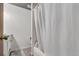 Bathroom with white shower curtain, gray floors, and a white vanity at 7904 Chase Cir # 146, Arvada, CO 80003