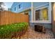 View of the exterior with blue siding and a wooden fence at 7904 Chase Cir # 146, Arvada, CO 80003