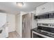 Bright kitchen with stainless steel appliances, microwave and ample storage at 7904 Chase Cir # 146, Arvada, CO 80003