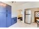 Well-lit kitchen featuring stainless steel appliances, breakfast nook and ample cabinet space at 3246 W 53Rd Ave, Denver, CO 80221