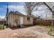 Quaint backyard with a stone patio and access to the garage at 3171 W 38Th Ave, Denver, CO 80211