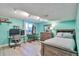 Charming bedroom with rustic wood furniture and ample natural light at 8262 Otis Ct, Arvada, CO 80003