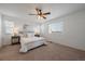 Bedroom features neutral paint, carpet and a ceiling fan at 9608 Albion Ln, Thornton, CO 80229