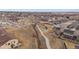 Aerial view of community park including playground, walking trails, and green space at 9608 Albion Ln, Thornton, CO 80229