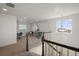 Upstairs loft with carpet and windows for lots of natural light at 9608 Albion Ln, Thornton, CO 80229