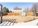 Fenced backyard featuring a storage shed and lawn with stepping stones to the patio at 1812 24Th Ave, Longmont, CO 80501