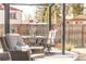 Backyard patio with a table and chairs set beneath a pergola at 1812 24Th Ave, Longmont, CO 80501