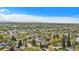 Panoramic aerial view showcasing the city skyline and lush green residential areas at 295 E Amherst Ave, Englewood, CO 80113