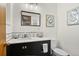 Modern bathroom features a stylish vanity, sleek fixtures, and contemporary design at 295 E Amherst Ave, Englewood, CO 80113
