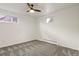 Clean bedroom with bright natural light, neutral walls, and plush carpeting at 295 E Amherst Ave, Englewood, CO 80113