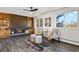 Inviting living room features a cozy brick fireplace and stylish decor, perfect for relaxation at 295 E Amherst Ave, Englewood, CO 80113
