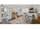 Open-concept living space featuring stylish decor and seamlessly connecting to the adjacent dining area at 295 E Amherst Ave, Englewood, CO 80113