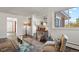 Bright living room featuring hardwood floors, neutral walls, and an open floor plan at 295 E Amherst Ave, Englewood, CO 80113