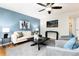 Comfortable living room featuring hardwood floors, designer decor, and natural light at 375 Aspenwood Ct, Lafayette, CO 80026