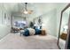 Spacious main bedroom with high ceilings, a ceiling fan, and a large window with natural light at 375 Aspenwood Ct, Lafayette, CO 80026