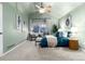 Spacious main bedroom with high ceilings, a ceiling fan, and a large window with natural light at 375 Aspenwood Ct, Lafayette, CO 80026