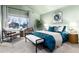 Spacious main bedroom with high ceilings, a ceiling fan, and a large window with natural light at 375 Aspenwood Ct, Lafayette, CO 80026