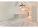 The bedroom has neutral carpeting, a ceiling fan, and light-colored walls at 1121 W 112Th Ave # C, Denver, CO 80234