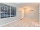 Inviting entryway featuring tile floors, natural light from a large window, and coat hooks at 1121 W 112Th Ave # C, Denver, CO 80234