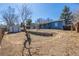 A home with an unfenced backyard and utility shed at 2260 S Lewiston St, Aurora, CO 80013