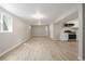 Spacious basement area with kitchenette and natural light at 2260 S Lewiston St, Aurora, CO 80013