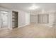 Spacious basement area with light wood-look floors, recessed lighting, and multiple rooms at 2260 S Lewiston St, Aurora, CO 80013