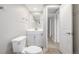 Bathroom with a vanity, mirror, and doorway leading to additional rooms at 2260 S Lewiston St, Aurora, CO 80013