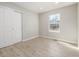 Cozy bedroom with new flooring, closet, and natural light at 2260 S Lewiston St, Aurora, CO 80013
