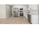 Modern kitchen with stainless steel appliances, white cabinets, and subway tile backsplash at 2260 S Lewiston St, Aurora, CO 80013