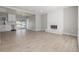 Open concept living area featuring fireplace, back yard access and adacent kitchen at 2260 S Lewiston St, Aurora, CO 80013