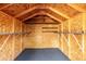 Inside of the storage shed showing shelving and storage space at 1060 S Eaton St, Lakewood, CO 80226