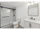 Modern bathroom with glass shower and updated vanity at 5060 S Fox St, Englewood, CO 80110